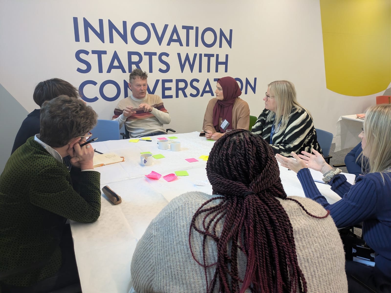 attendees working together during a table exercise